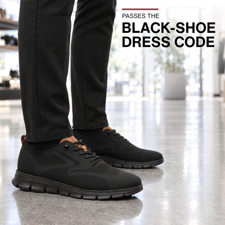 Black Midnight Breeze sneakers with black work trousers on a polished floor, passing a black-shoe dress code